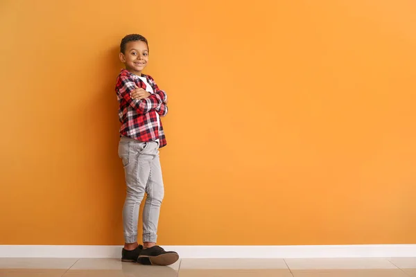 Fashionable African-American boy near color wall — Stock Photo, Image