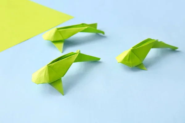 Cute origami fish on color background — Stock Photo, Image