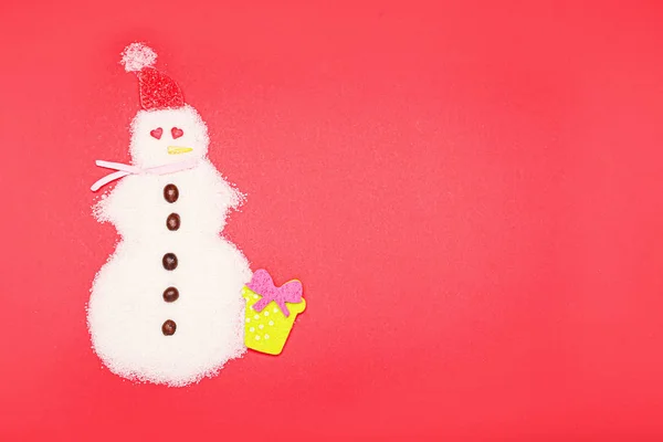 Snowman made of sugar on color background — Stock Photo, Image