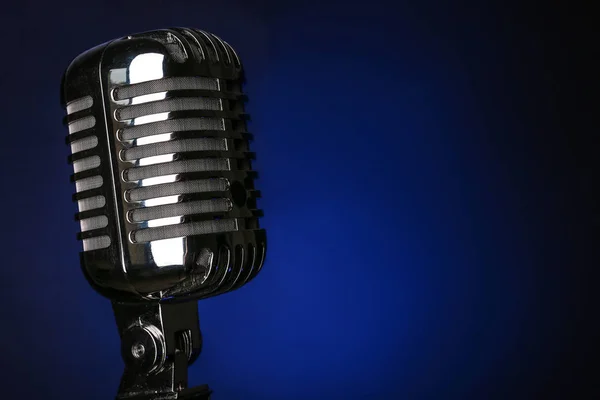 Retro microphone on dark background — Stock Photo, Image