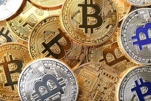 Many bitcoins as background, top view — Stock Photo, Image