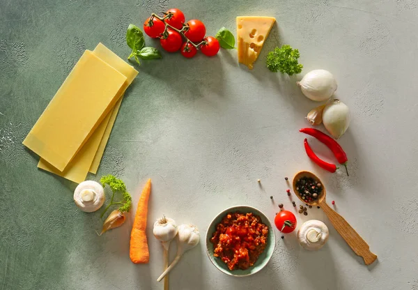 Frame made of ingredients for lasagna on light background — Stock Photo, Image