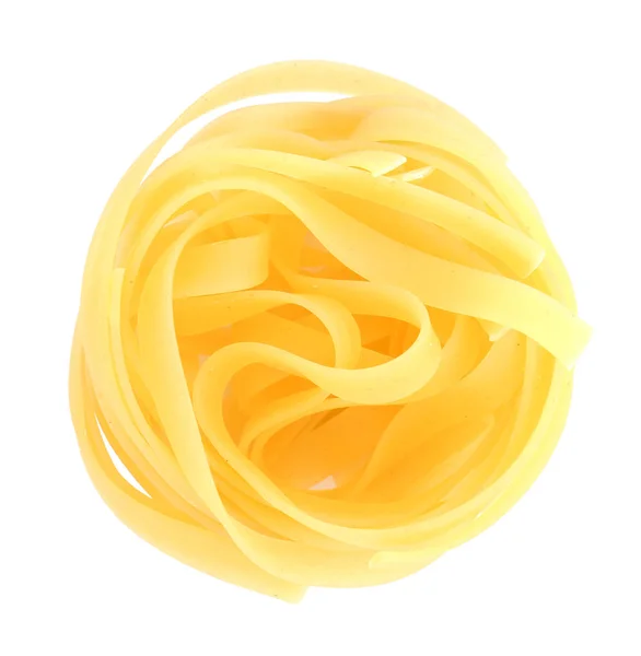 Tasty uncooked pasta on white background — Stock Photo, Image