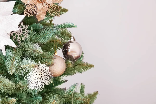 Beautiful decorated Christmas tree on light background, closeup — Stock Photo, Image