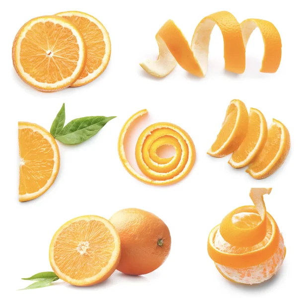 Набор сочных апельсинов на белом фоне — стоковое фото