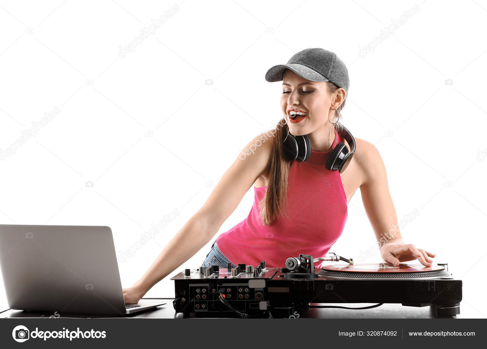 Female dj playing music on white background Stock Photo by ©serezniy  320874092