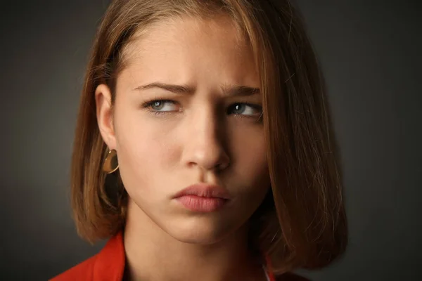 Sad teenage girl on dark background, closeup — Stock Photo, Image