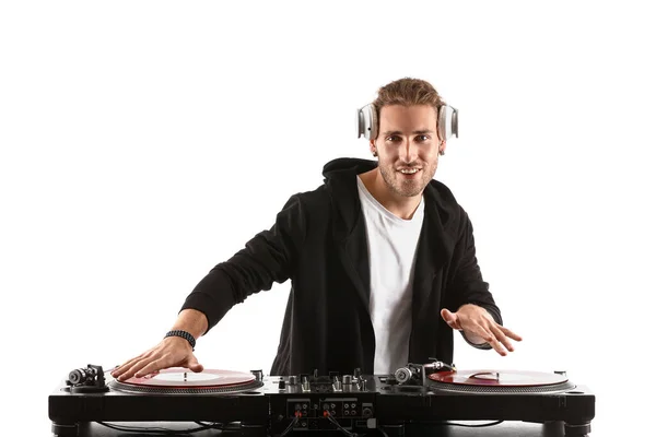 Male dj playing music on white background — Stock Photo, Image