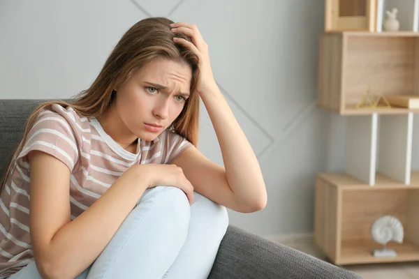 Portrait of depressed woman at home — ストック写真