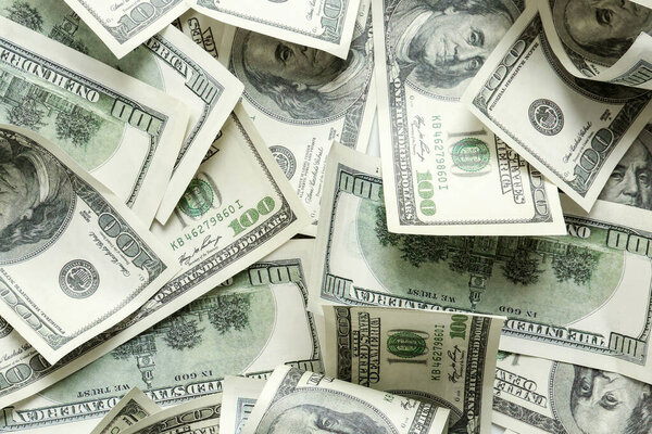 Куча долларовых банкнот в качестве фона
