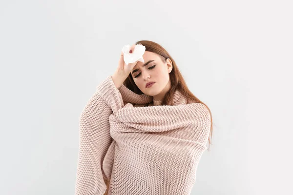 Woman ill with flu on light background — ストック写真