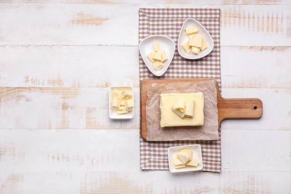 Composition with tasty butter on table — Stock Photo, Image