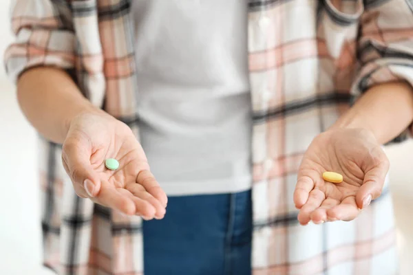 Young woman with pills, closeup — Stock Photo, Image