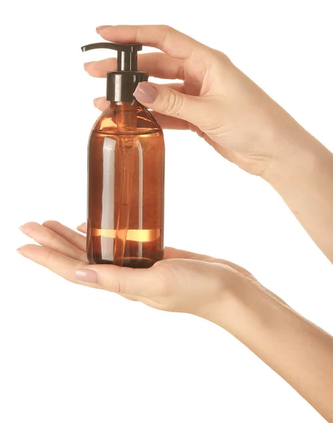 Női kéz kozmetikai termék palack fehér alapon — Stock Fotó