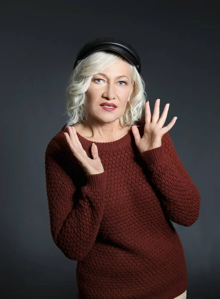 Portrait of stylish mature woman on dark background — Stock Photo, Image