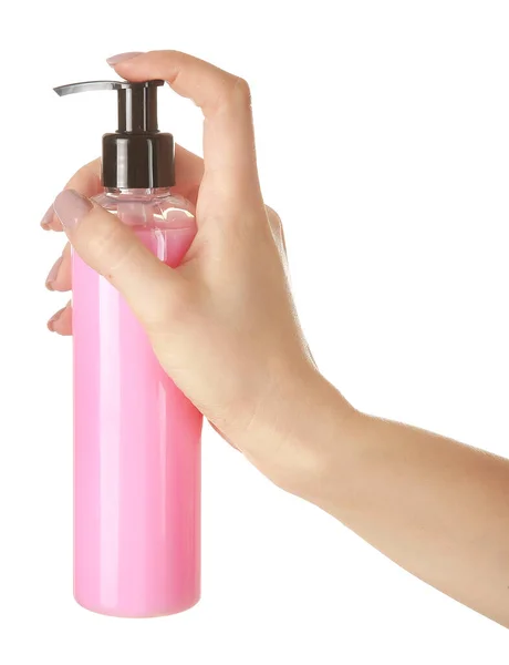 Vrouwelijke hand met cosmetisch product in fles op witte achtergrond — Stockfoto