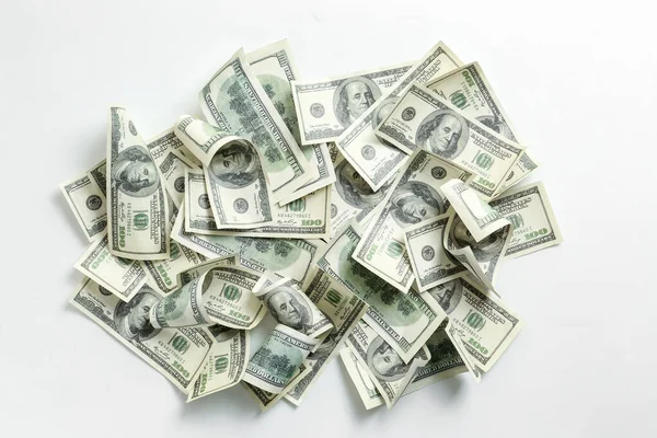 Pico de notas de dólar sobre fundo branco — Fotografia de Stock