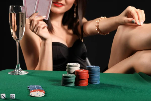 Female poker player at table in casino — Stock Photo, Image