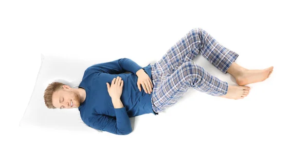 Hombre dormido guapo sobre fondo blanco — Foto de Stock