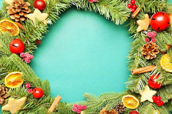 Beautiful Christmas wreath on color background — Stock Photo, Image