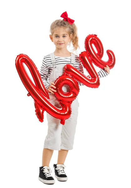 Cute little girl with air balloon in shape of word LOVE on white background. Valentines Day celebration — Stock Photo, Image