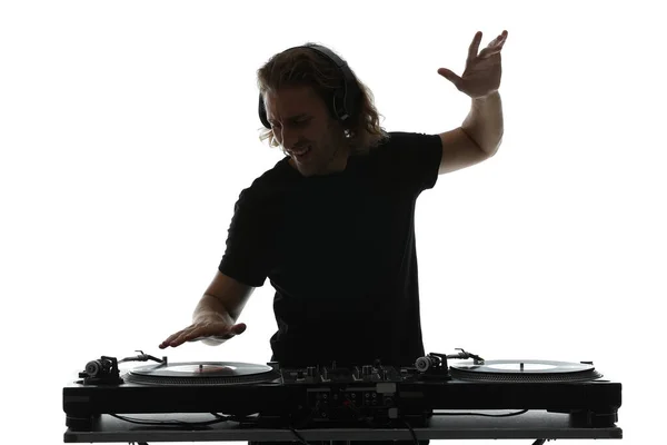 Silhouette of male dj playing music on white background — Stock Photo, Image