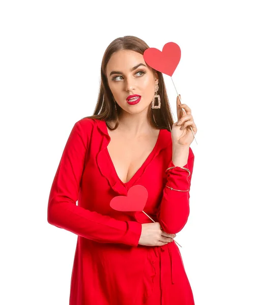 Hermosa joven con corazones rojos sobre fondo blanco. Celebración de San Valentín — Foto de Stock