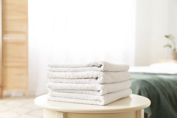 Clean soft towels on table — Stock Photo, Image