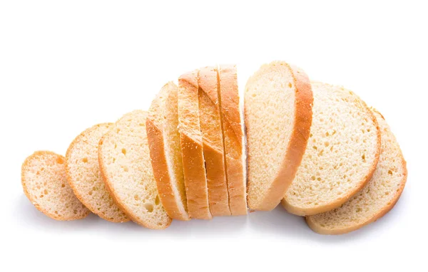 Szeletelt kenyér fehér alapon — Stock Fotó