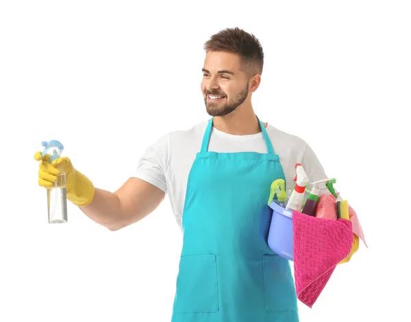 Homem zelador com suprimentos de limpeza em fundo branco — Fotografia de Stock