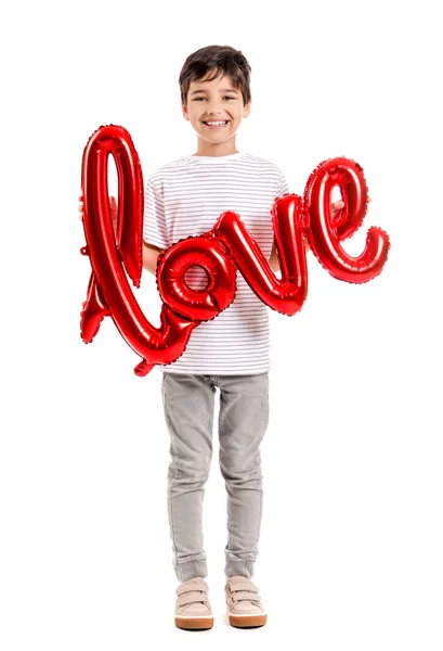 Милий хлопчик з повітряною кулькою у формі слова Любов на білому тлі. Свято Валентинів — стокове фото