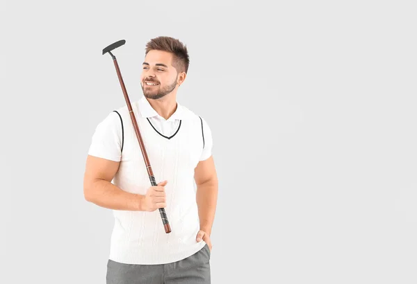 Guapo golfista masculino sobre fondo blanco — Foto de Stock