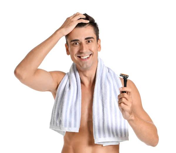 Handsome young man with razor on white background — Stock Photo, Image