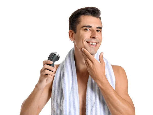 Handsome young man with electric razor on white background — Stock Photo, Image