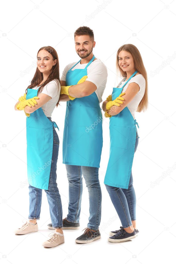 Team of janitors on white background