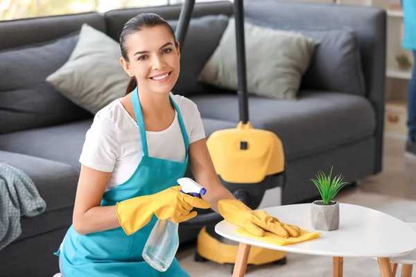 Portrait of female janitor cleaning room — Stock Photo, Image