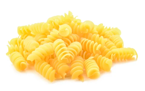 Tasty uncooked pasta on white background — Stock Photo, Image