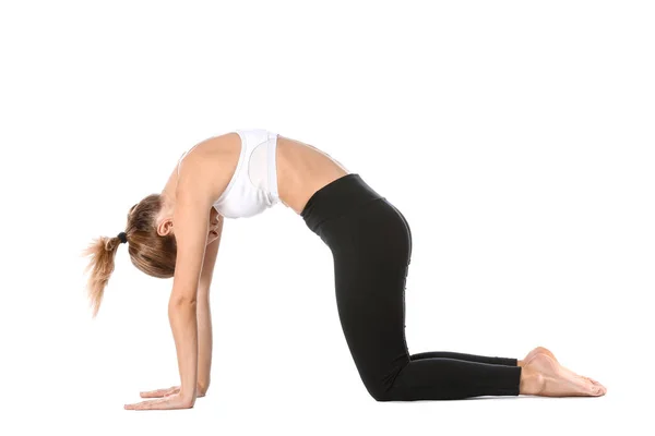 Vacker ung kvinna som utövar yoga på vit bakgrund — Stockfoto