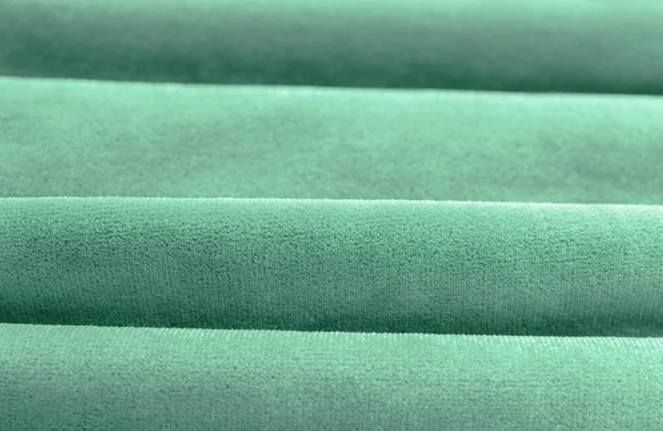 Texture of turquoise fabric, closeup