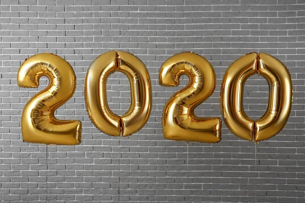 Figure 2020 made of balloons on brick background — Stock Photo, Image
