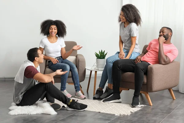 Young African-American friends meeting at home