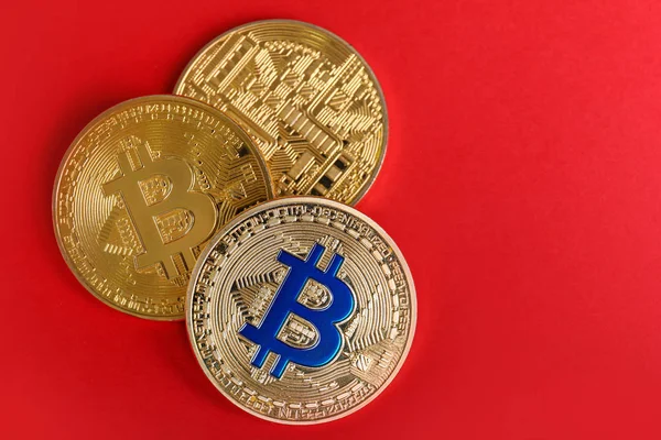 Three bitcoins on color background — Stock Photo, Image