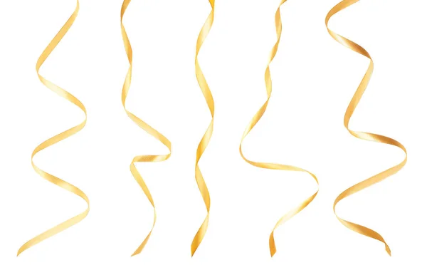 Красивые золотые ленты на белом фоне — стоковое фото
