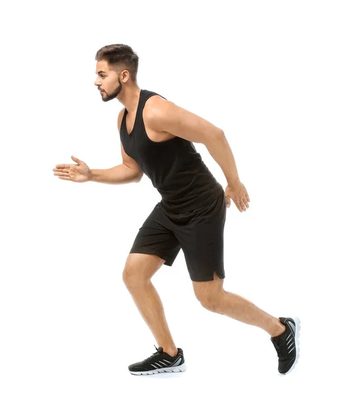 Sportos fiatal férfi futó fehér háttér — Stock Fotó