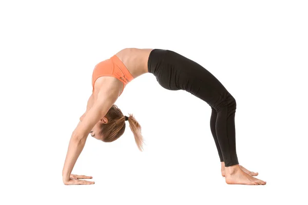 Hermosa joven practicando yoga sobre fondo blanco —  Fotos de Stock