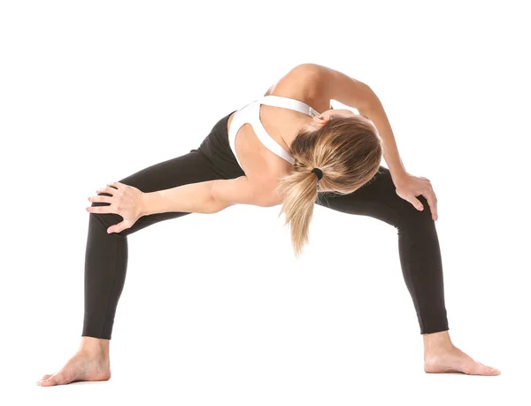 Hermosa joven practicando yoga sobre fondo blanco —  Fotos de Stock