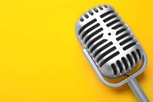 Retro microphone on color background — Stock Photo, Image