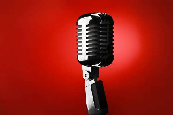 Retro microphone on color background — Stock Photo, Image