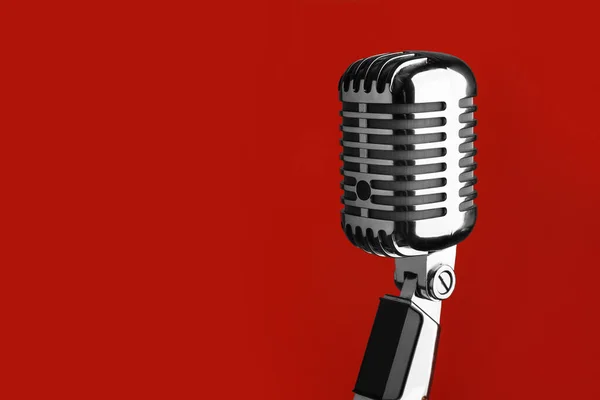 Retro microphone on color background — Stock Photo, Image