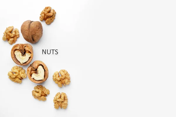 Tasty walnuts on white background — Stock Photo, Image